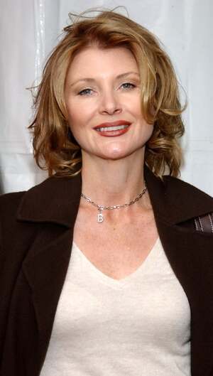 Beth Broderick nude 6